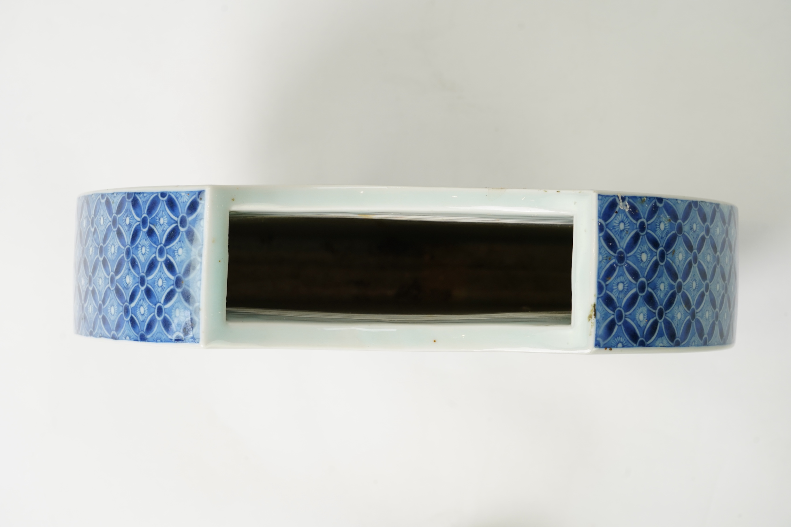 A Japanese blue and white crescent moon-shaped vase, probably Arita, late 19th century